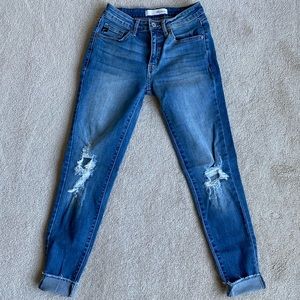 Distressed knee jeans, boutique brand